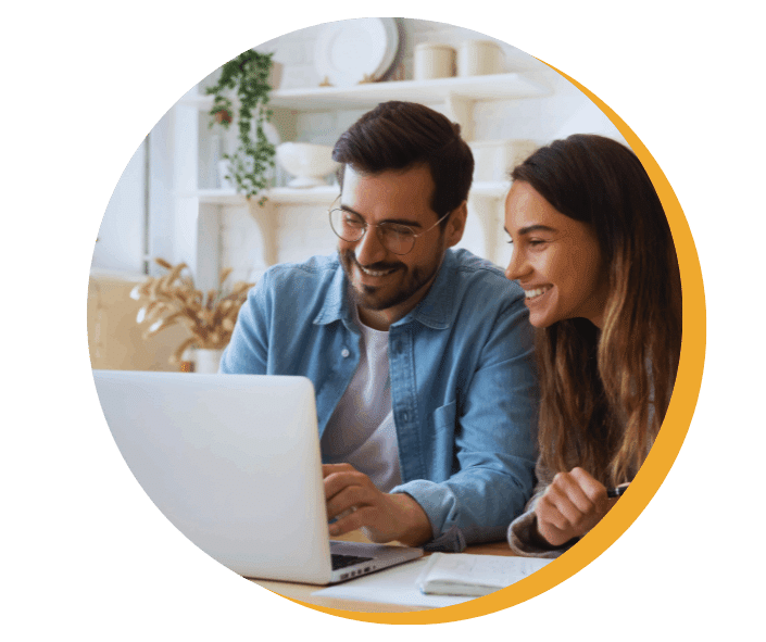 first home buyers couple on a laptop